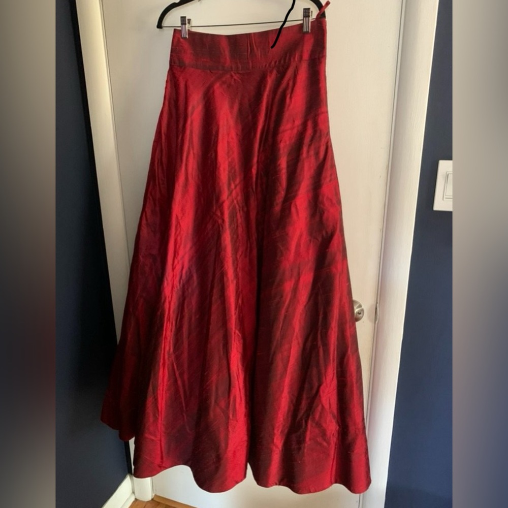 Raw silk skirt with a net lining to make it look like a ball gown.